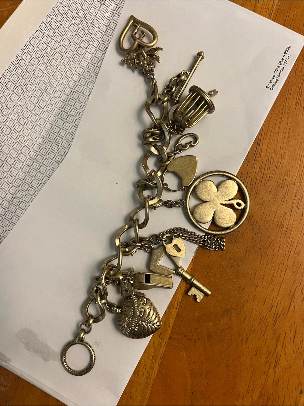 Money 75 anniversary Gold-Tone Charm Bracelet with Clover, Key & Heart Charms